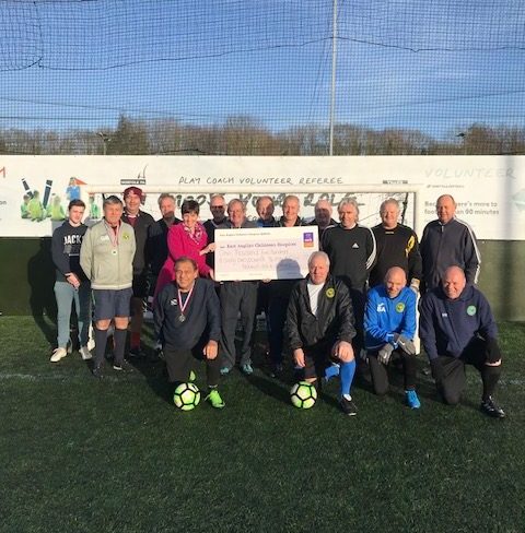 Veteran footballers take to the pitch for charity tournament