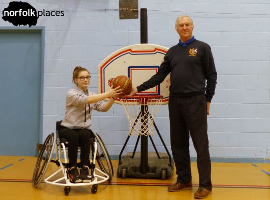 Peter presents Norwich Low Riders presents member Rhiannan with her new sports wheelchair